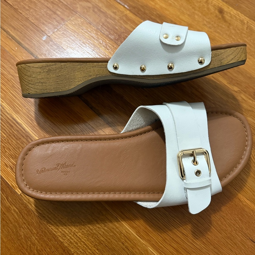 8.5 women’s white slides.
